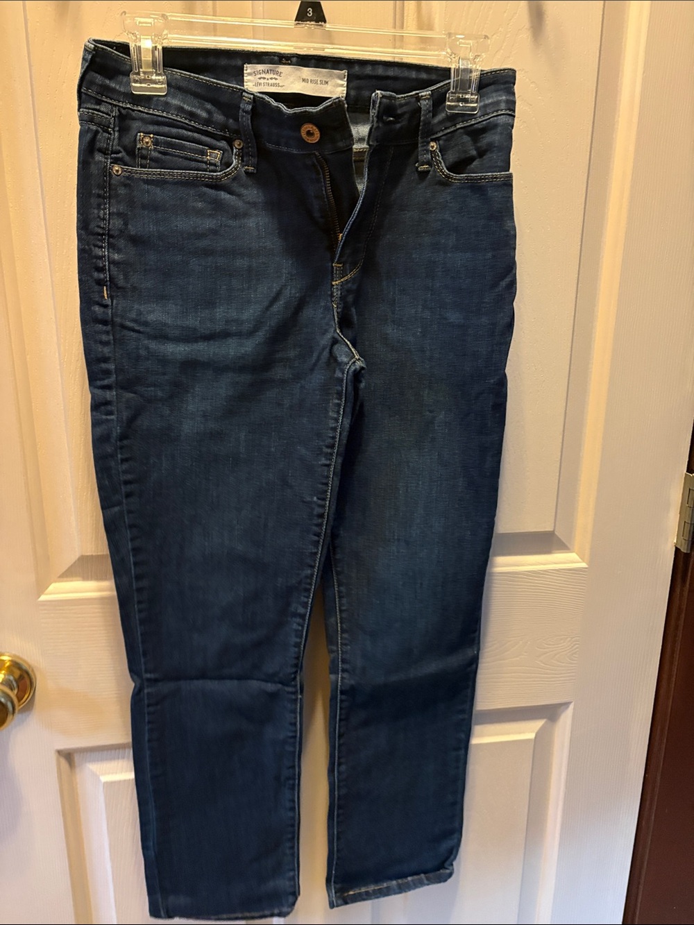 Women’s Dark Blue Levis Mis Rise Slim Sz 4